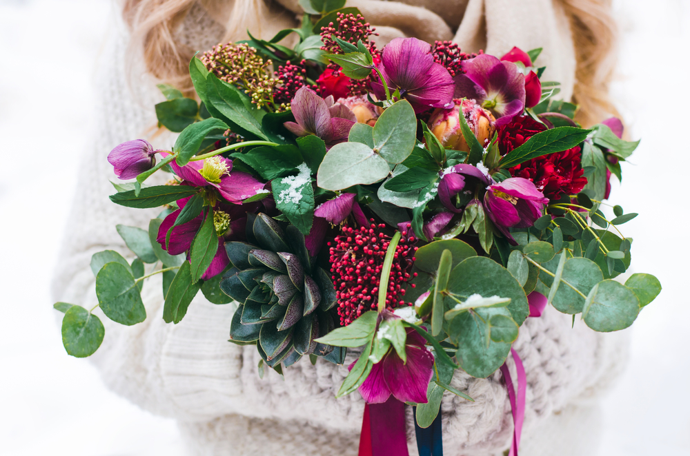 Bridal bouquet with red and burgundy colors and succulents