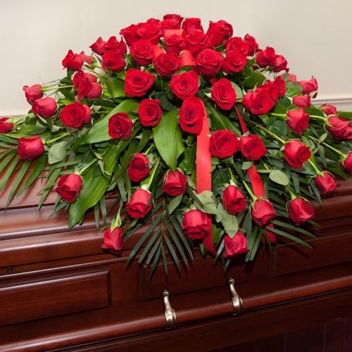 Dearly Departed Casket Spray - Red Roses